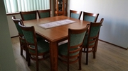 Square wooden dining table with 8 matching chairs. Hardly used.